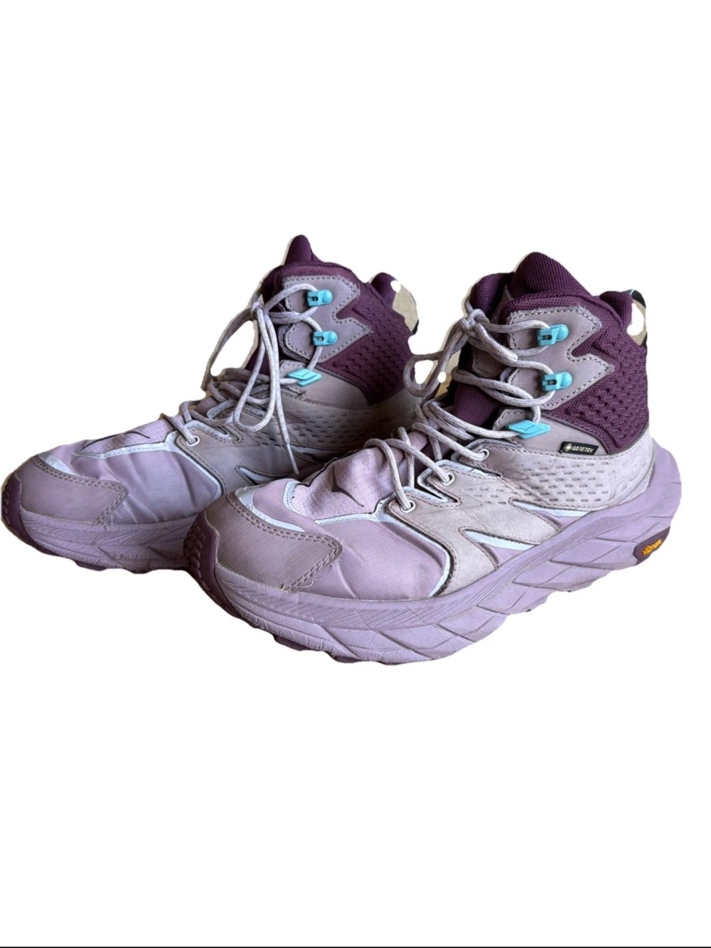 Hoka Lavender and Deep Purple High-Top Trail Sneakers